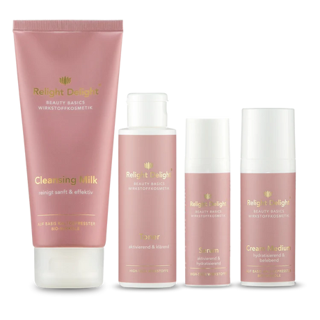 Das Bild zeigt das "Beauty Basics Gesichts-Set Medium parfümfrei - 4-teiliges Anti-Aging Hautpflege-Set ohne Duftstoffe für empfindliche reife Haut"Eine Tube Cleansing Milk, ein Toner, ein Serum und eine Tube mit der Creme Medium