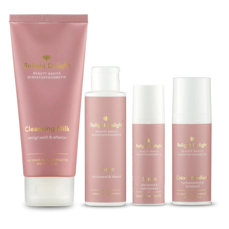 Das Bild zeigt das "Beauty Basics Gesichts-Set Medium parfümfrei - 4-teiliges Anti-Aging Hautpflege-Set ohne Duftstoffe für empfindliche reife Haut"Eine Tube Cleansing Milk, ein Toner, ein Serum und eine Tube mit der Creme Medium