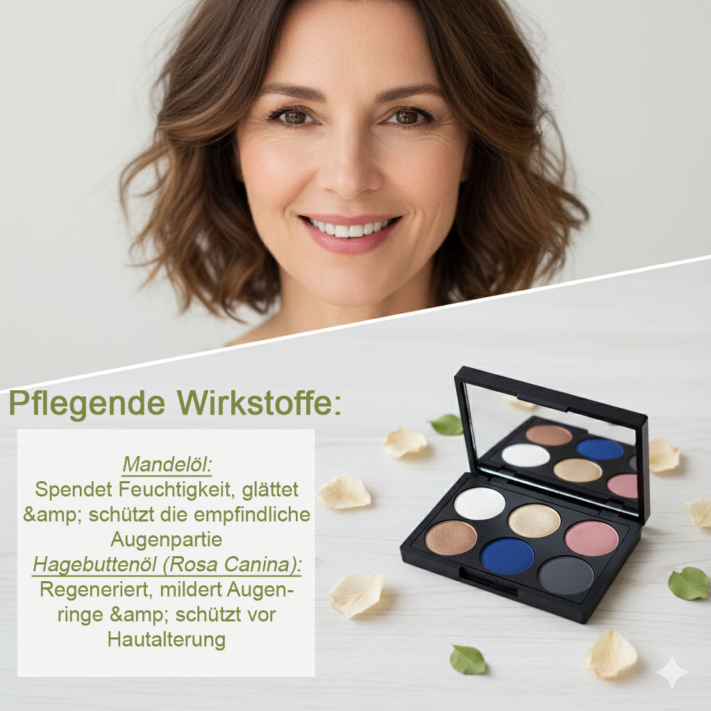 Ein lächelndes Frauengesicht im oberen Teil des Bildes. Im unteren Teil befindet sich eine offene Lidschattenpalette von "That's me organic" auf Holz, umgeben von Blütenblättern. Daneben eine Textbox mit "Pflegende Wirkstoffe:" und Details zu Mandelöl und Hagebuttenöl für Feuchtigkeit, Glättung, Regeneration und Schutz der Augenpartie.
