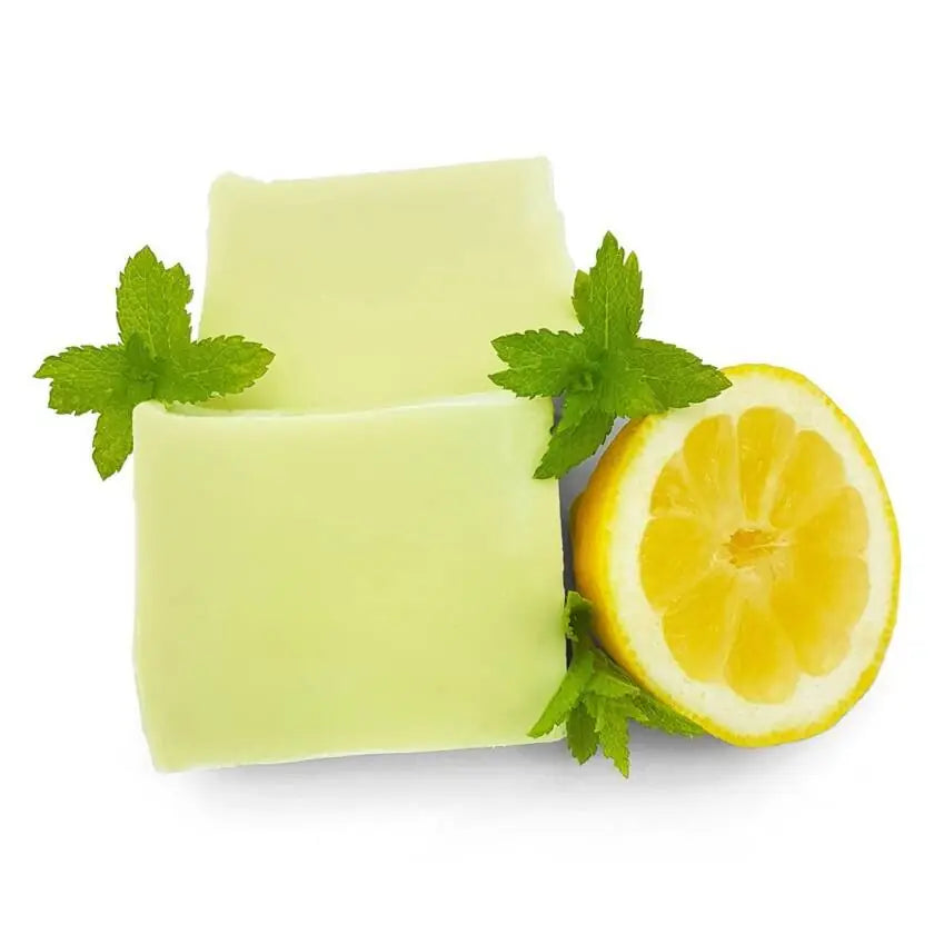 Handgemachte Minze-Zitrone Naturseife von Kleine Auszeit – rechteckiges Seifenstück mit frischer, gelb-grüner Farbgebung, erhältlich in 90 g und 20 g Testergröße.
