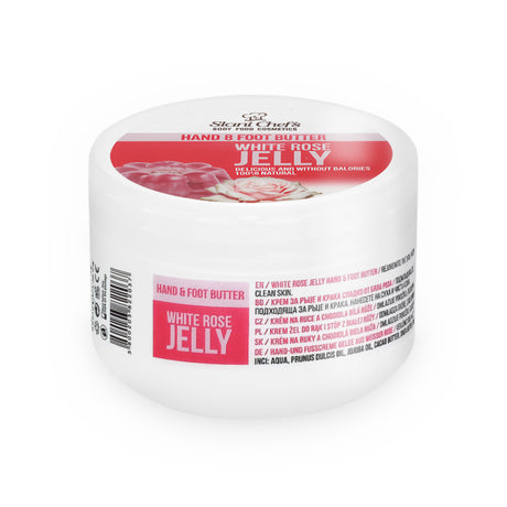 „Weiße Dose der natürlichen Hand- und Fußcreme aus weißer Rose, dekoriert mit einem zarten Gelleetörtchen und einer weißen Rose, Produktbezeichnung sichtbar.“