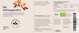 Nahaufnahme der veganen Bio Ashwagandha Kapseln gefüllt mit 660 mg reinem Bio-Wurzelpulver