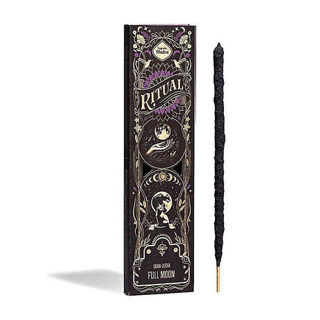 Produktverpackung Sagrada Madre Ritual Räucherwerk Vollmond mit vergoldeten Mondornamenten und einem schwarzen Räucherstäbchen daneben.