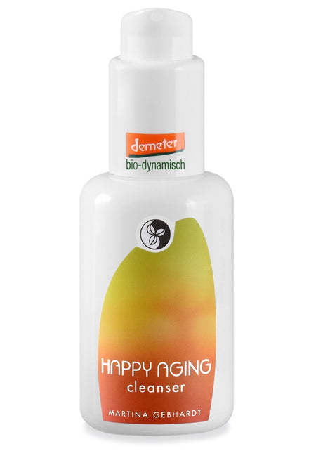 HAPPY AGING Cleanser von Martina Gebhardt – cremige Demeter‑Gesichtsreinigung für reife Haut in weißer Flasche mit gelbem Etikett